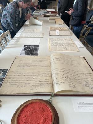 Guests of the ILAB delegation studying founding records of the Nobel Library 2